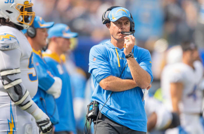 Brandon Staley on a headset during a Chargers game